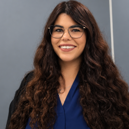 Smiling Professional Portrait in Gray Studio